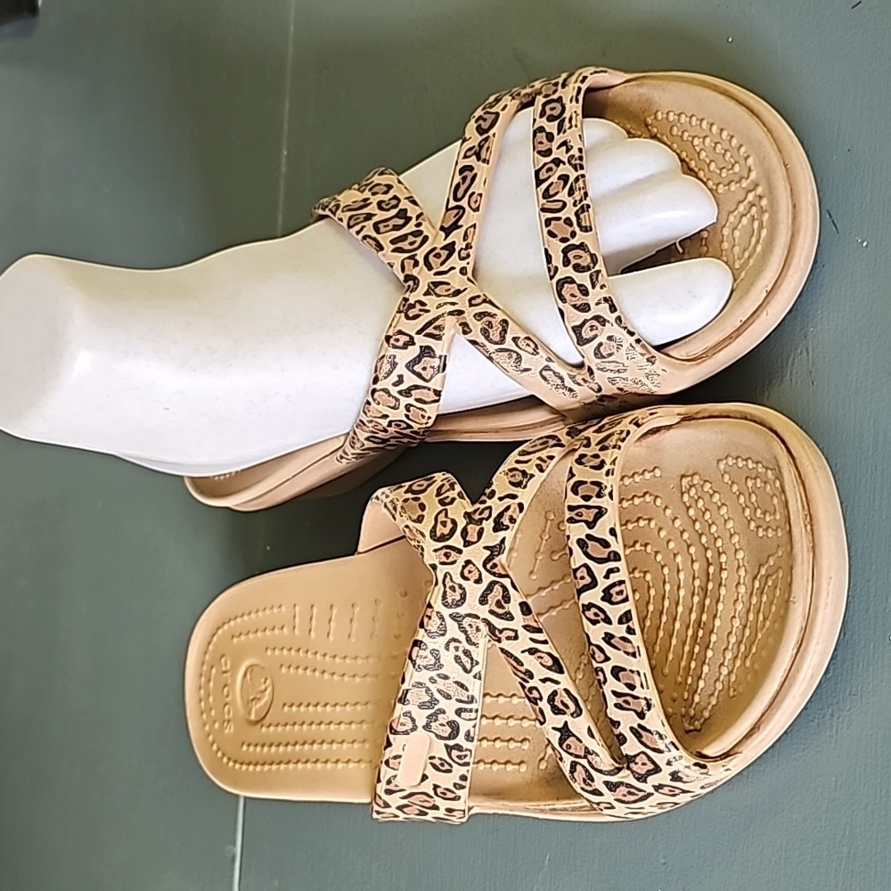 Crocks, ribber‎ sandles with leopard design. Normal wear. Size  7